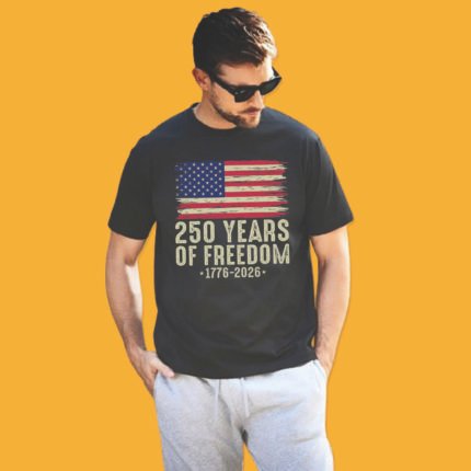 Unisex short sleeve t-shirt with distressed American flag and 250 Years of Freedom 1776-2026 commemorative text.