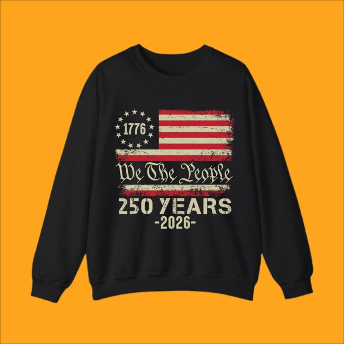 Unisex crewneck sweatshirt with vintage distressed American flag, 1776-2026 dates, and "We The People" constitutional script.