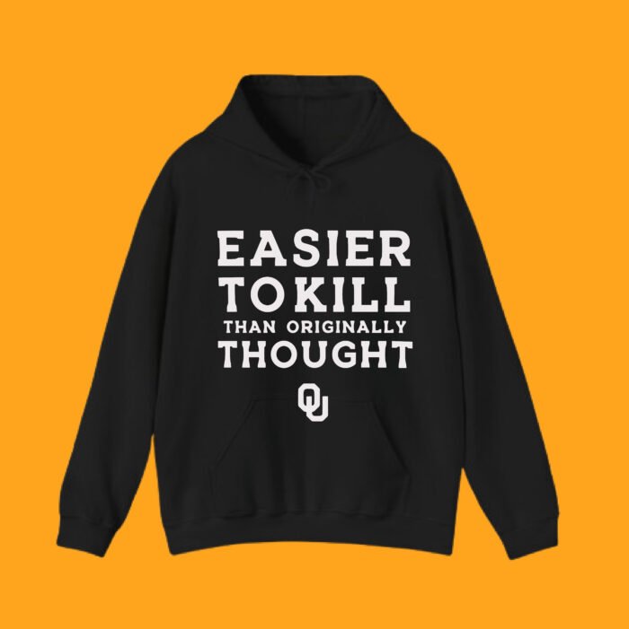 Heavyweight black hoodie with 'Easier To Kill Than Originally Thought' viral football slogan and OU logo.