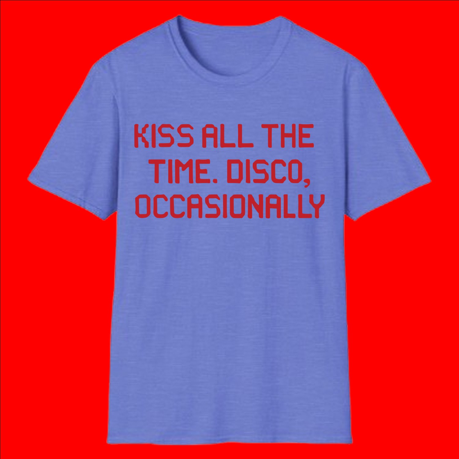 kiss-all-the-time-disco-occasionally-tee-shirt A man wearing a black unisex t-shirt with the red pixelated text "KISS ALL THE TIME. DISCO, OCCASIONALLY" standing against a yellow background.