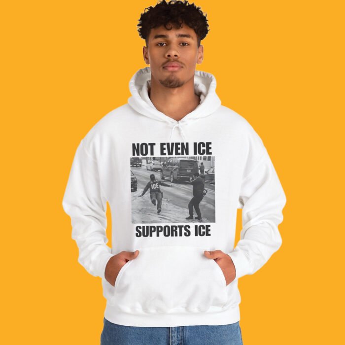 White t-shirt featuring a black and white viral meme photo of an ICE agent slipping on an icy road with the caption NOT EVEN ICE SUPPORTS ICE.