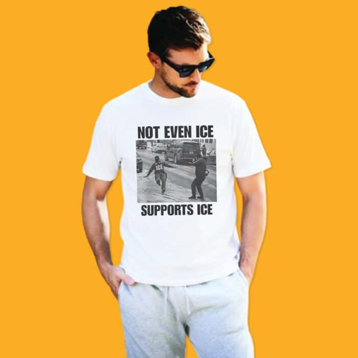 White t-shirt featuring a black and white viral meme photo of an ICE agent slipping on an icy road with the caption NOT EVEN ICE SUPPORTS ICE.