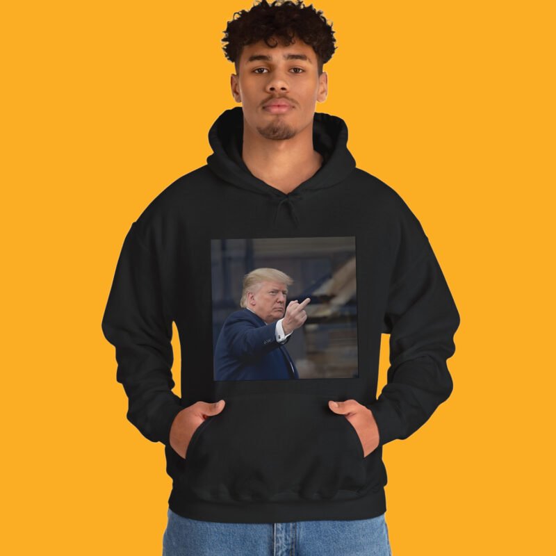 Donald Trump flipping the middle finger to a Ford factory worker in Dearborn Michigan on a black t-shirt.