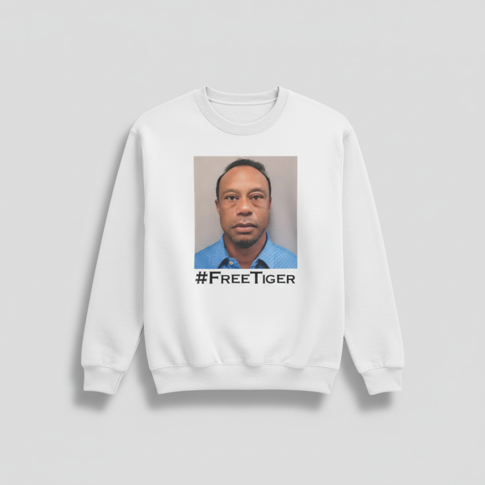 Close-up of high-definition Free Tiger mugshot print on premium apparel.